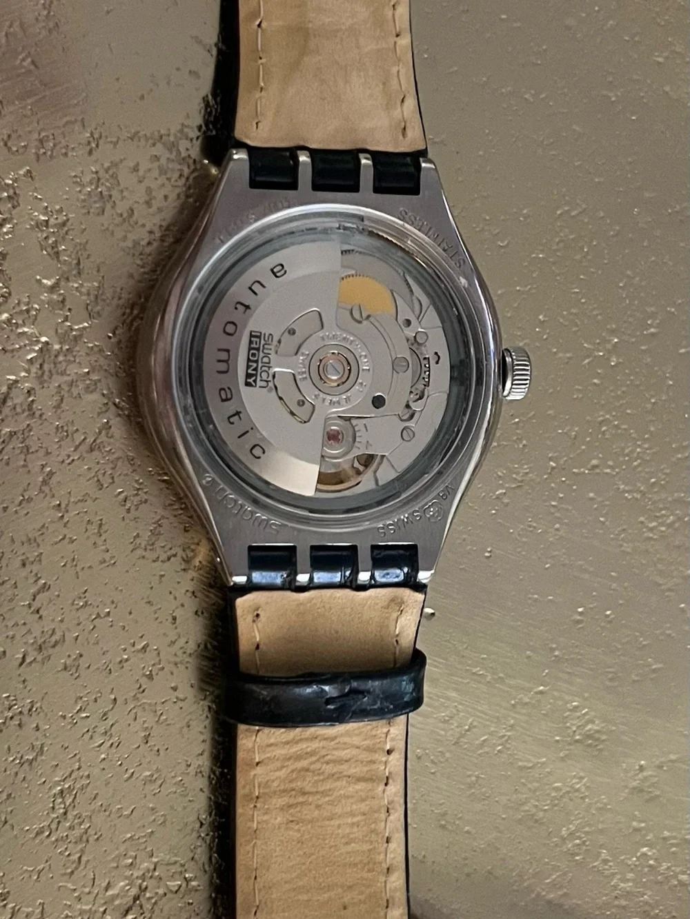 Swatch Silver Case Watch with Black Strap and White Dial